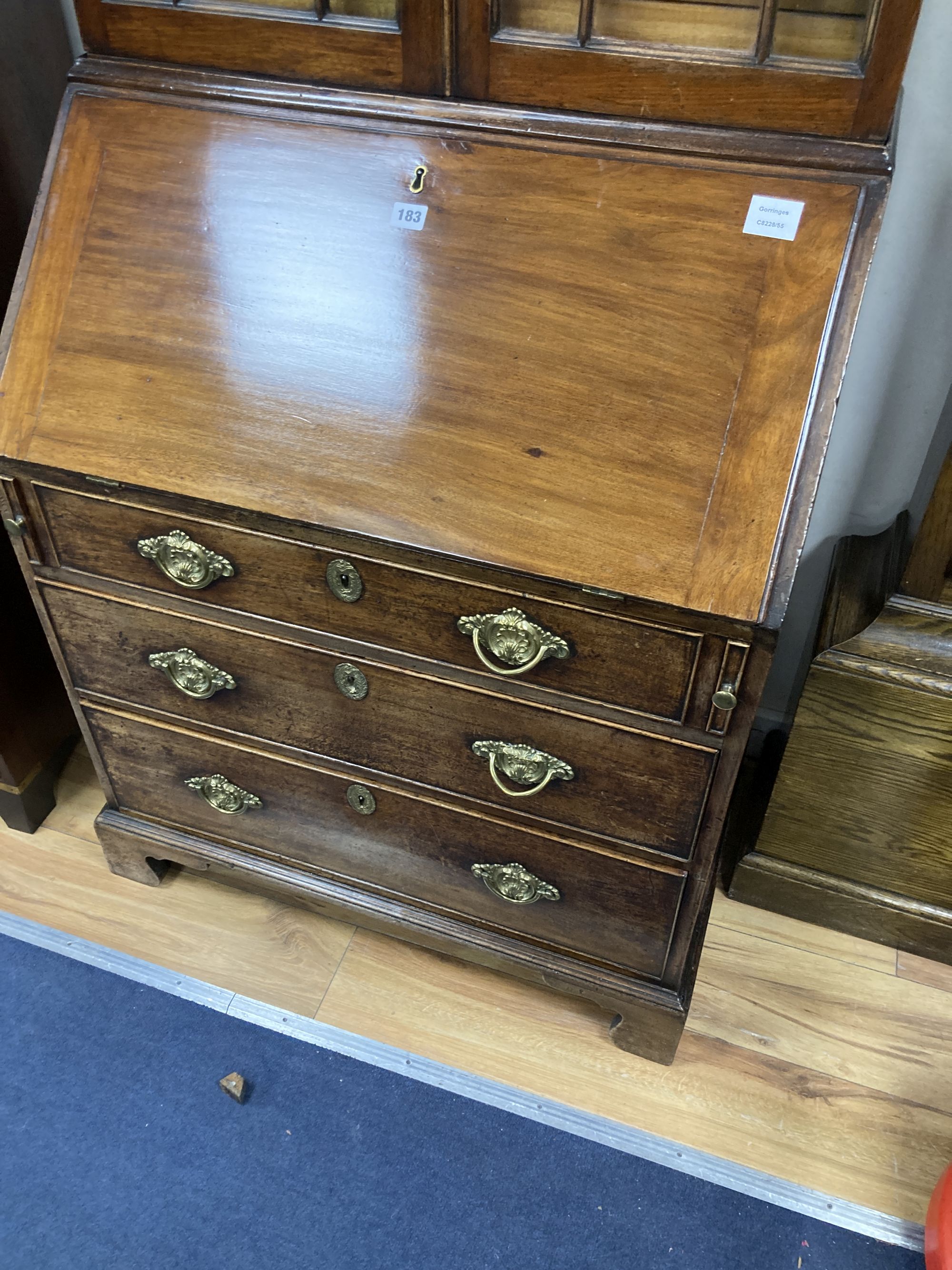 A small George III and later mahogany bureau bookcase, width 76cm, depth 50cm, height 192cm